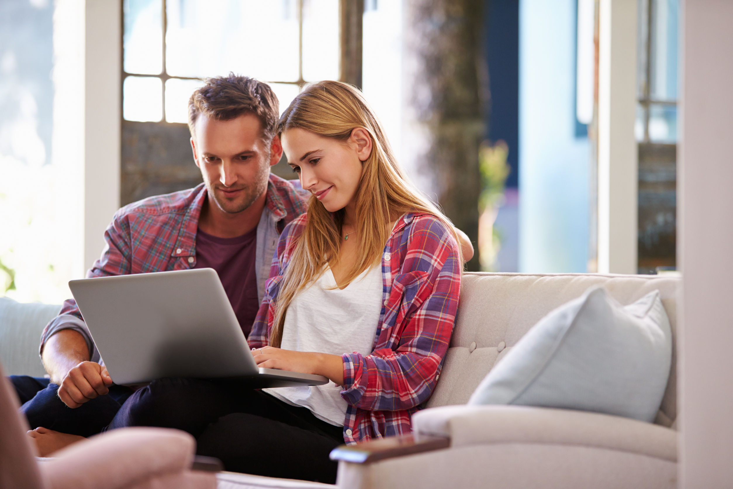 family looking at computer